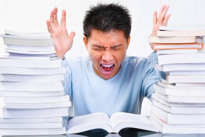 bigstockphoto_stress_asian_scholar_5099246